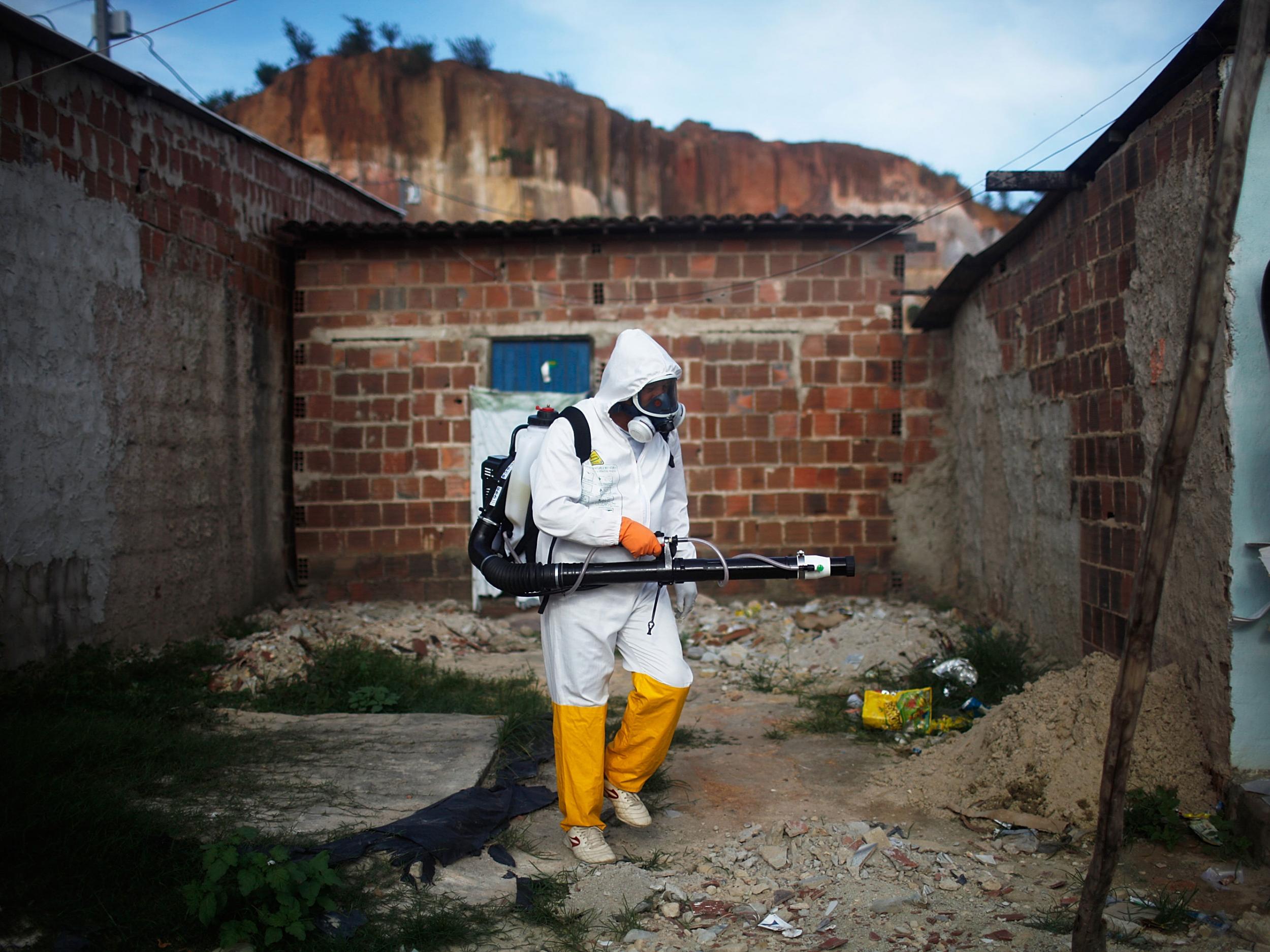 A city worker fumigates in an effort to eradicate the mosquito which transmits the Zika virus
