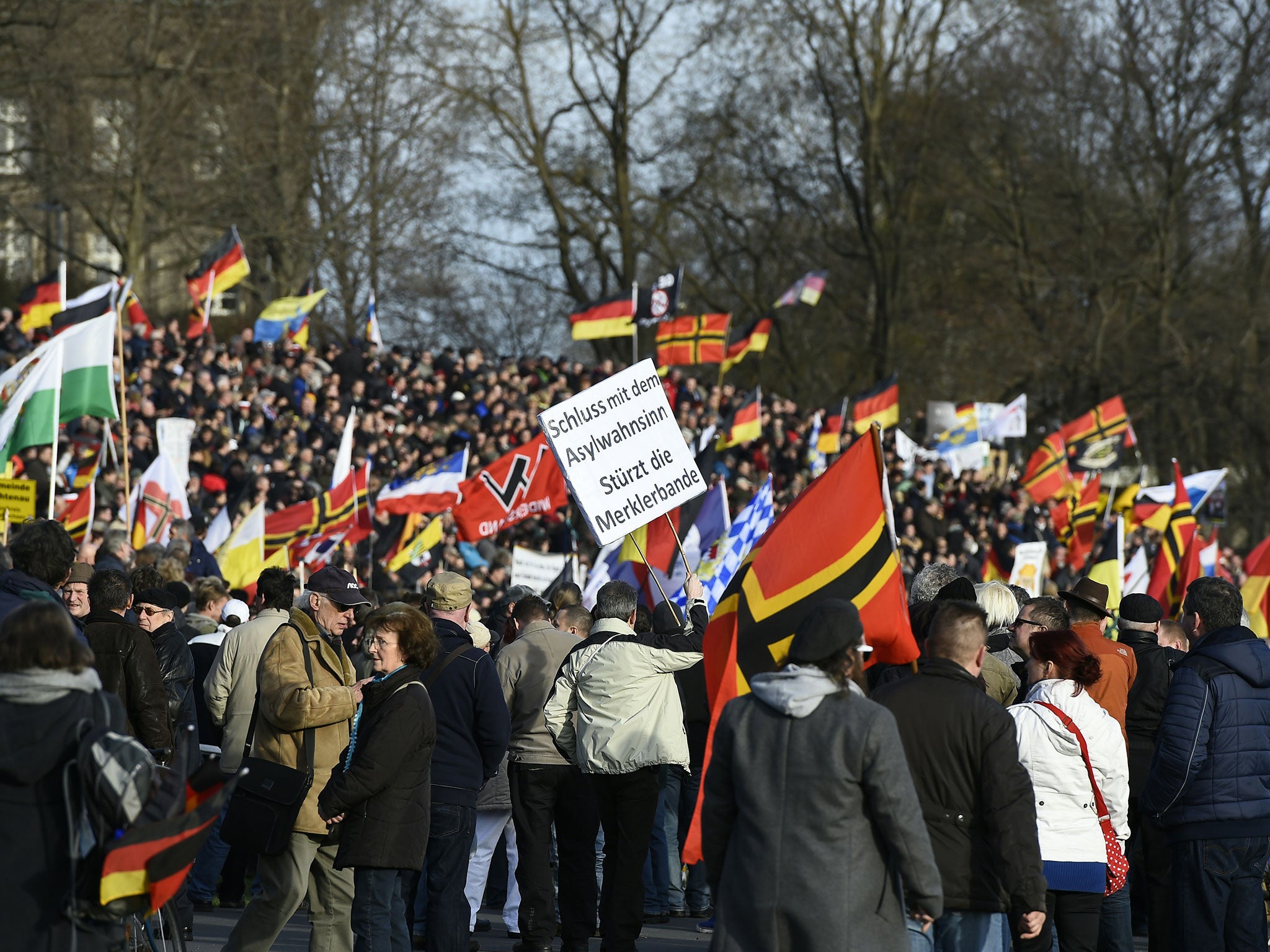 Pegida supporters gather in Dresden, eastern Germany, on 6 February, 2016