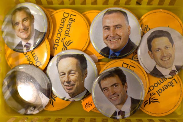 Liberal Democrat badges on sale at the party's annual conference in September last year. The Lib Dems want to move away from their " too male and too pale" status