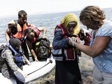 May urged to oppose plans to outlaw charities helping Syrian refugees