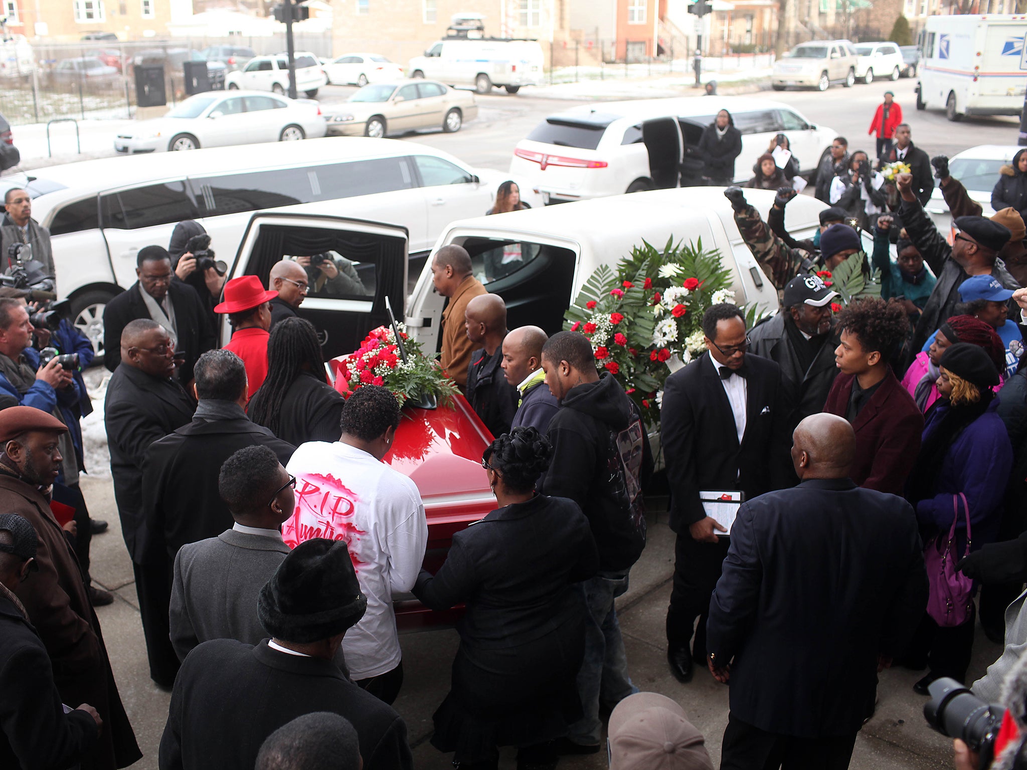 Pallbearers carry the casket of Bettie Jones during her funeral at New Mount Pilgrim Missionary Baptist Church