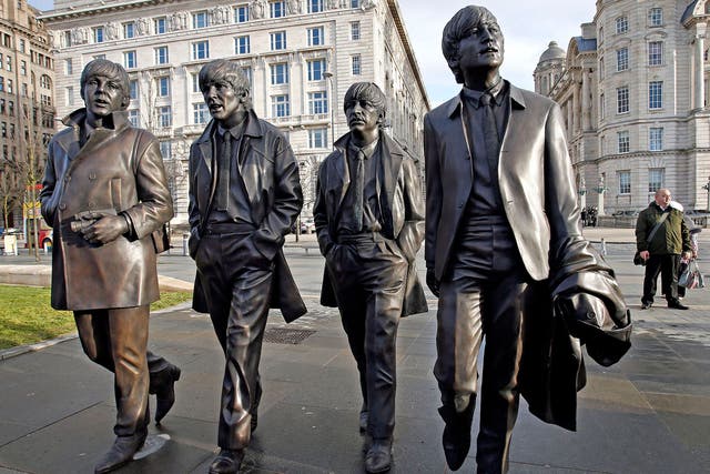 A statue of The Beatles outside Liverpool’s Royal Liver Building, unveiled in December