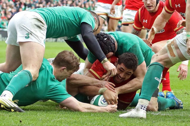 Taulupe Faletau scores Wales’ try against Ireland