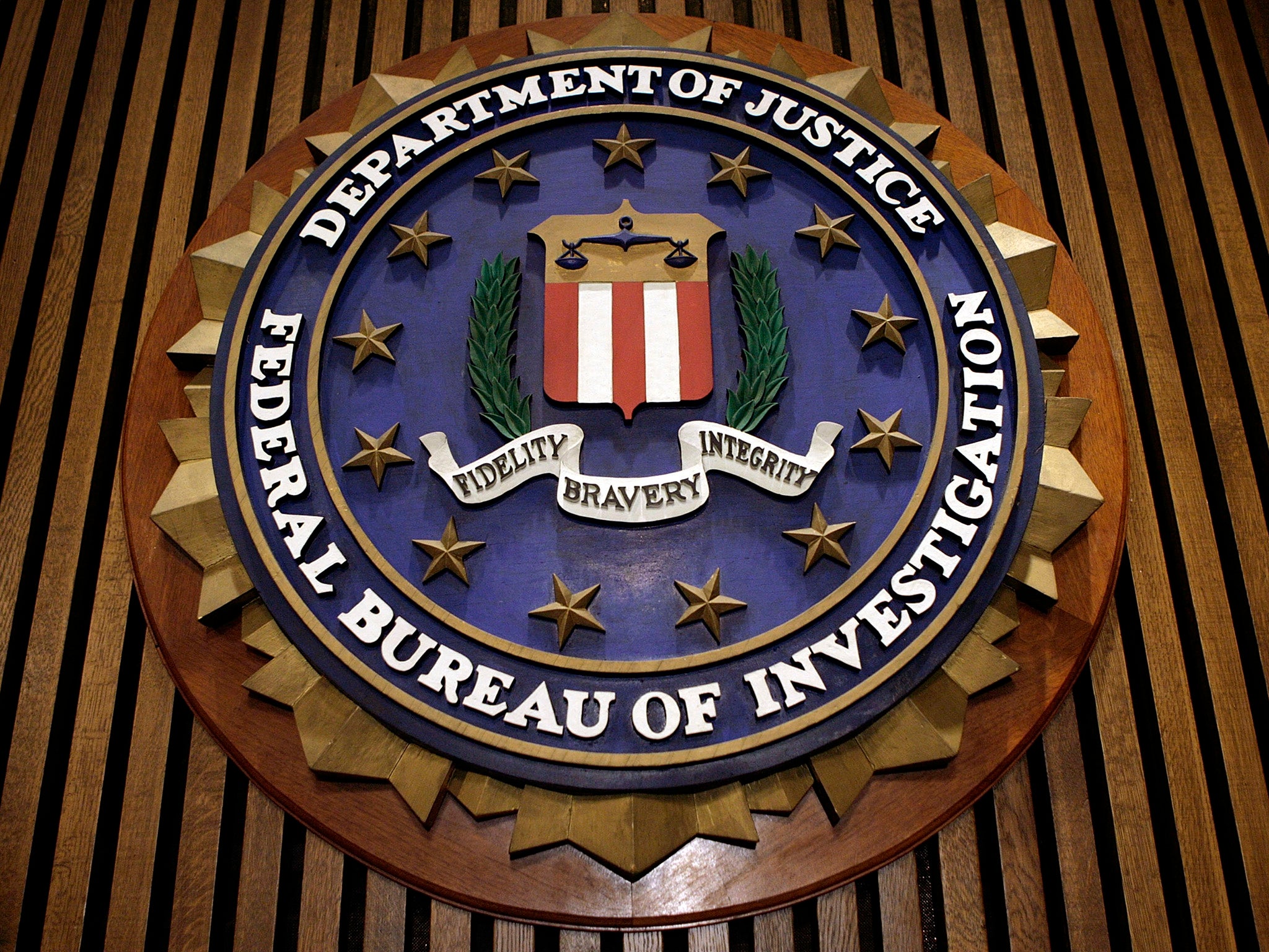 The FBI have accused the five men of conducting a bribery scheme which earned them $12,000