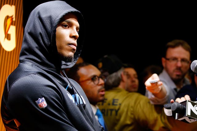 Cam Newton meets the press after Carolina Panthers' 24-10 defeat to Denver Broncos in Super Bowl 50