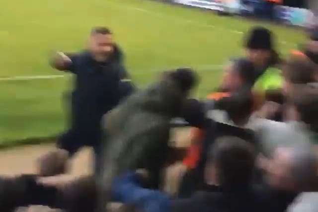 Southend fan attacks Colchester supporters after running onto pitch during heated Essex derby