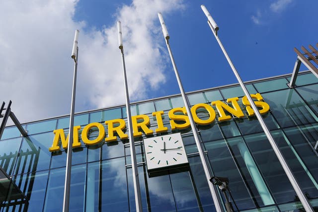 Morrisons reported an expected fall in annual profit on Thursday
