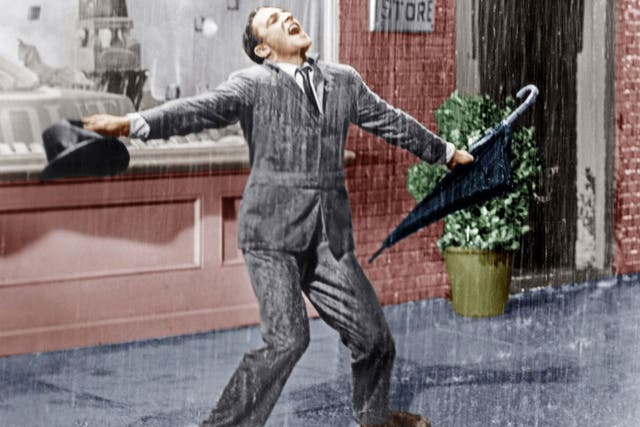 Gene Kelly in Singin' In The Rain from 1952. Researchers are exploring techniques which will allow viewers to sense “raindrops” on their hands or wind on their face as they are watching on television