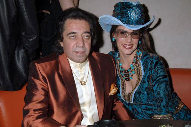 Sheikh Walid Juffali with Christina Estrada at the opening of Mo*Vida nightclub in 2005