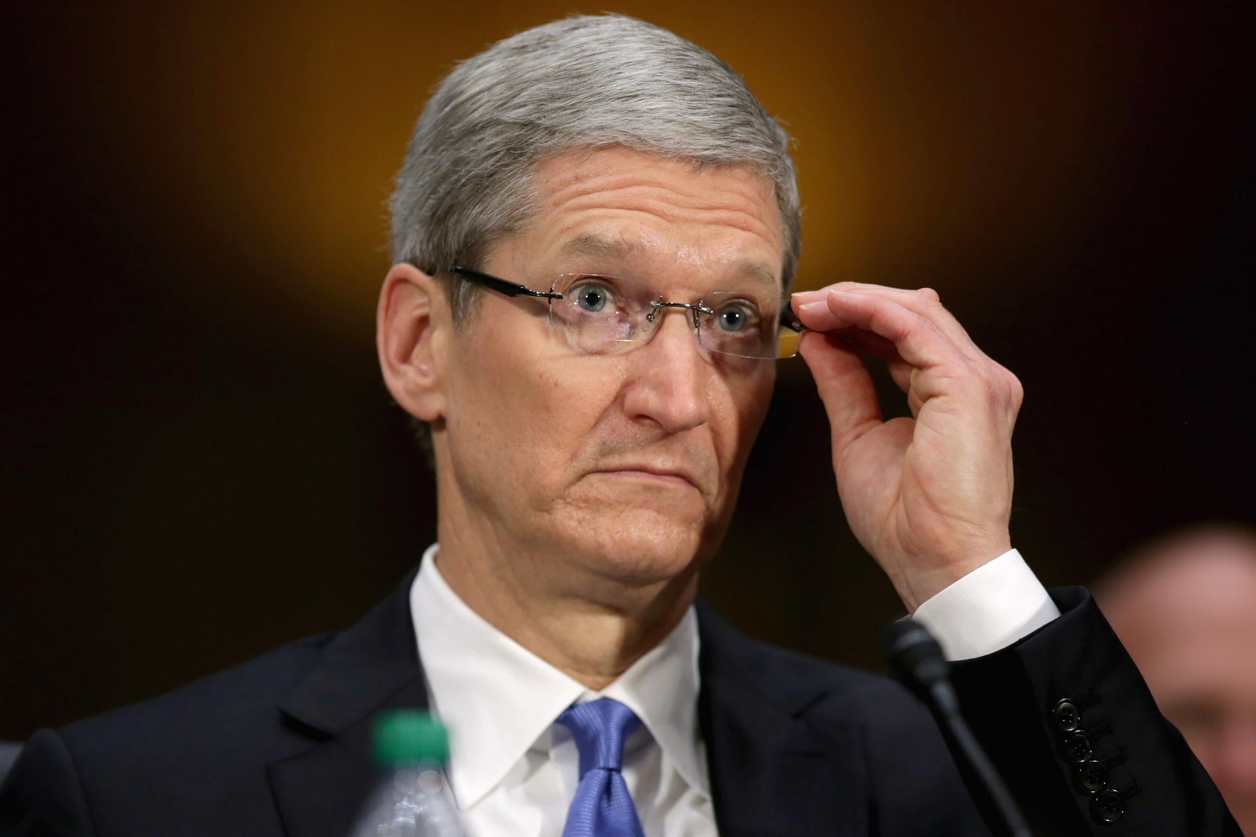 Apple CEO Tim Cook testifies before the Senate Homeland Security and Governmental Affairs Committee's Investigations Subcommittee about his company's offshore profit shifting