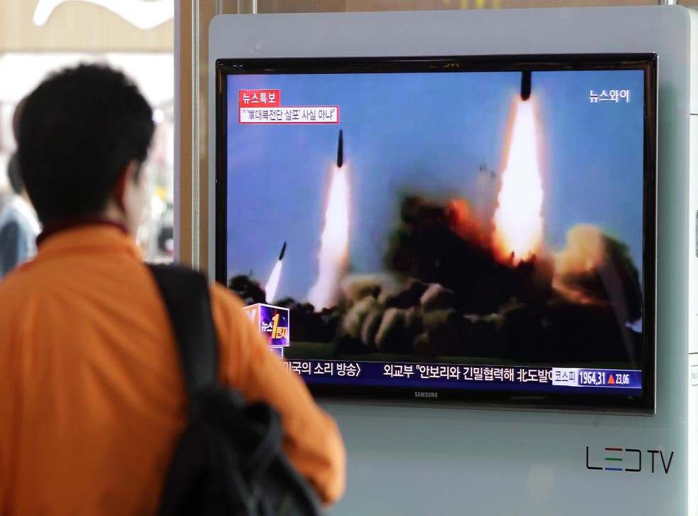 A man watches a North Korean missile launch in Seoul