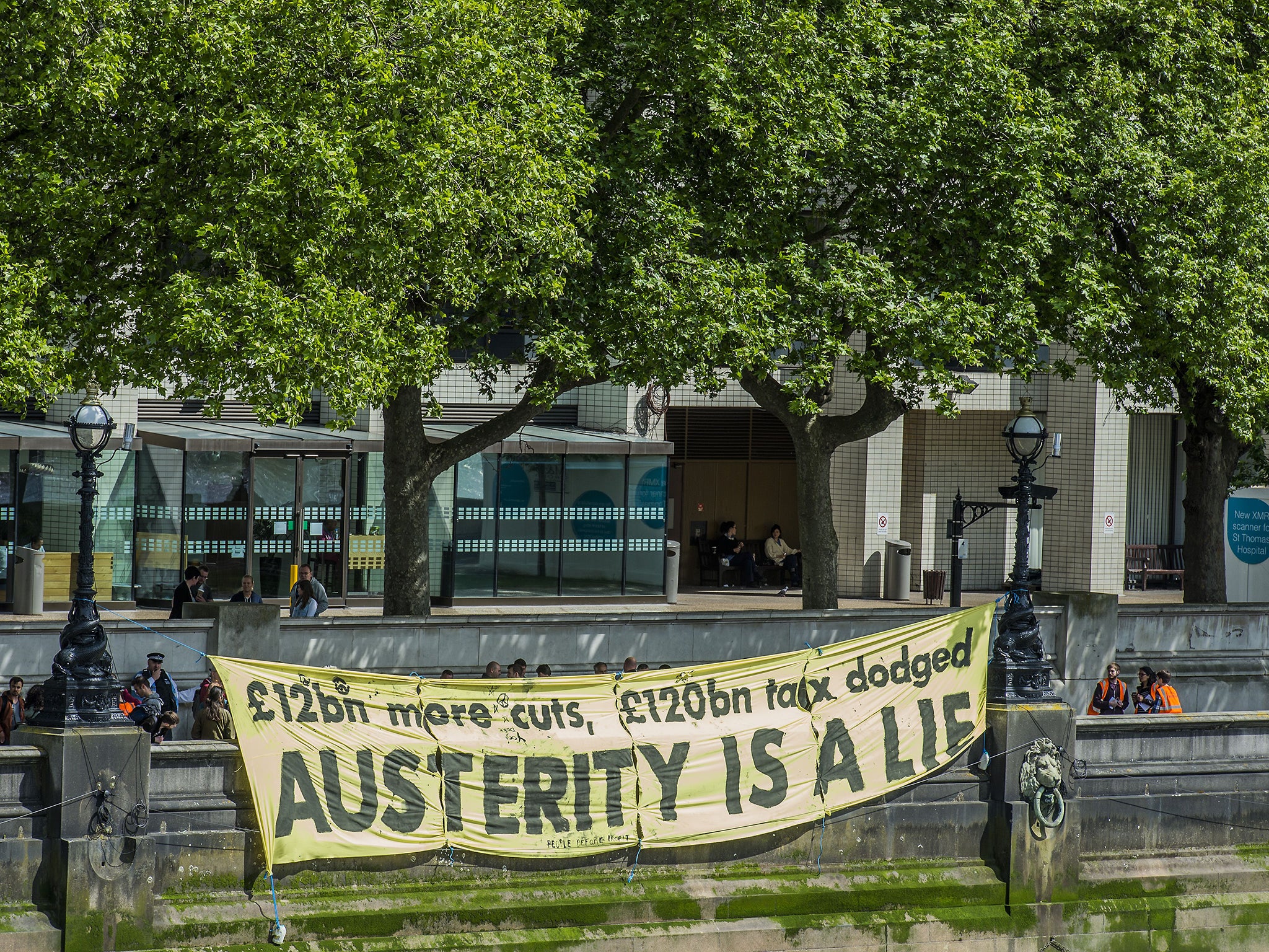 Anti-austerity protesters makes their feelings known during a demonstration in London last year