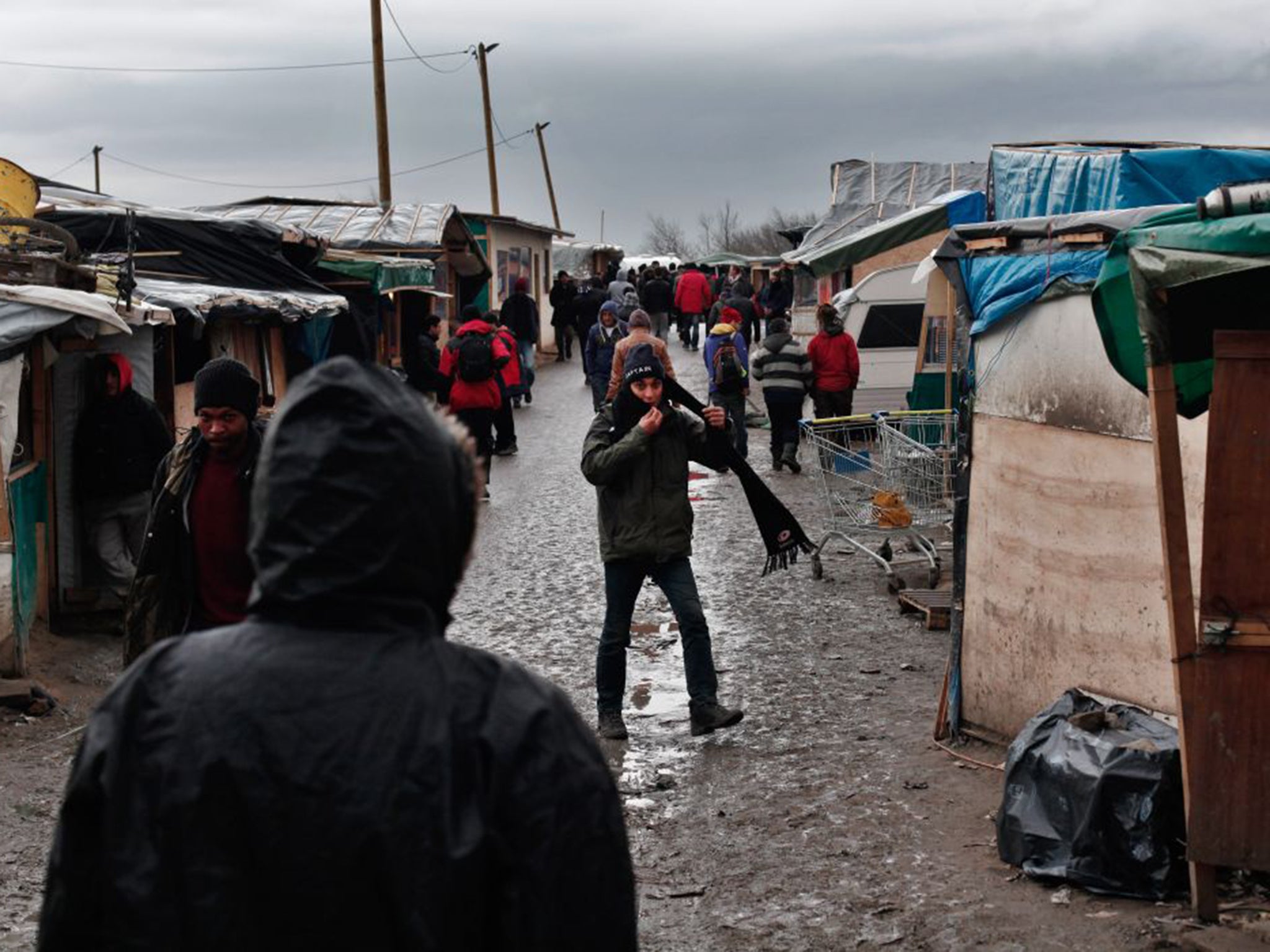 Migrants in Calais’ Jungle camp last week