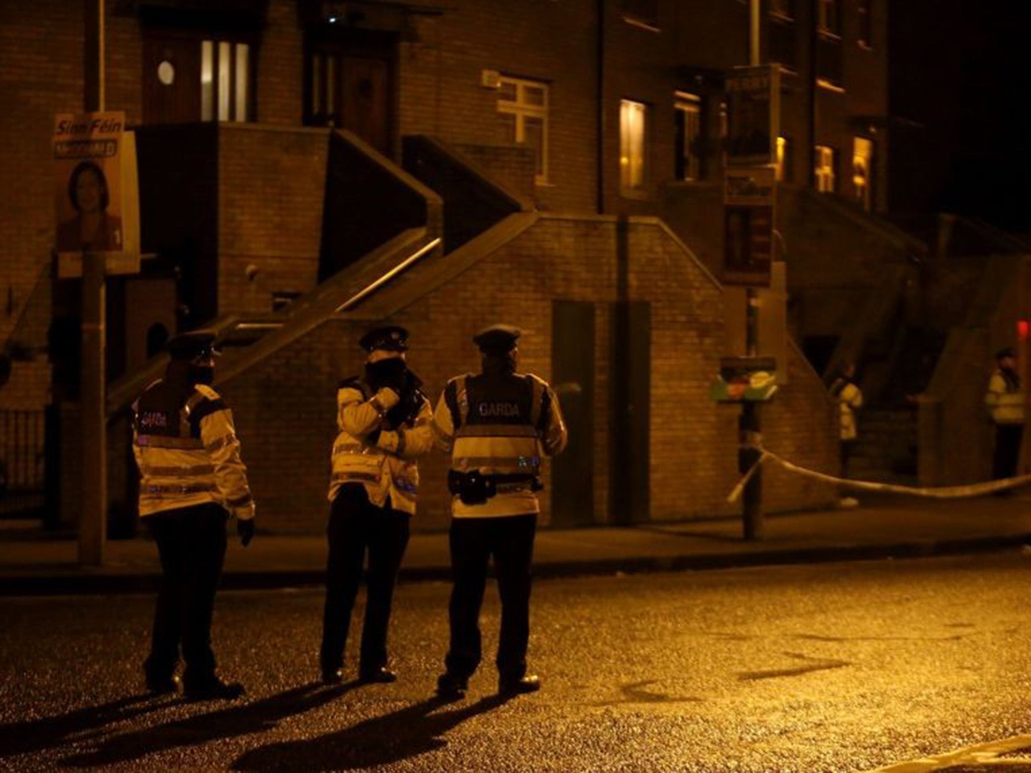 Irish Garda standing outside the house where Eddie Hutch Snr was shot dead