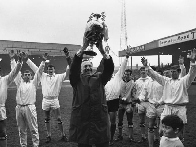 Manchester City’s Joe Mercer parades the First Division trophy in 1968