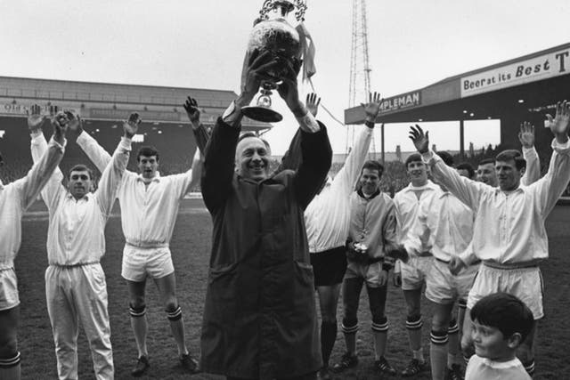 Manchester City’s Joe Mercer parades the First Division trophy in 1968
