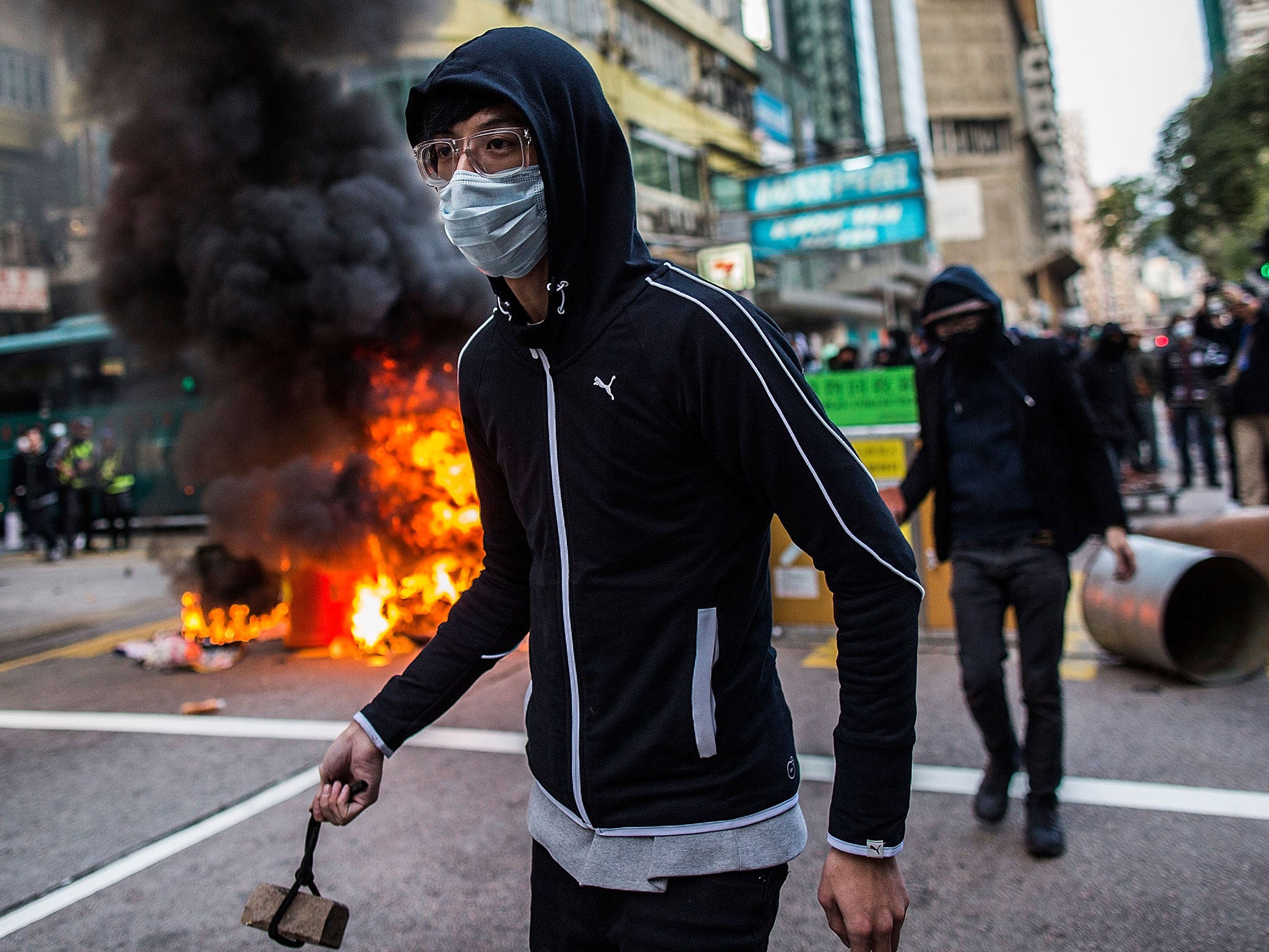 Some protesters threw bricks and set fire to rubbish bins