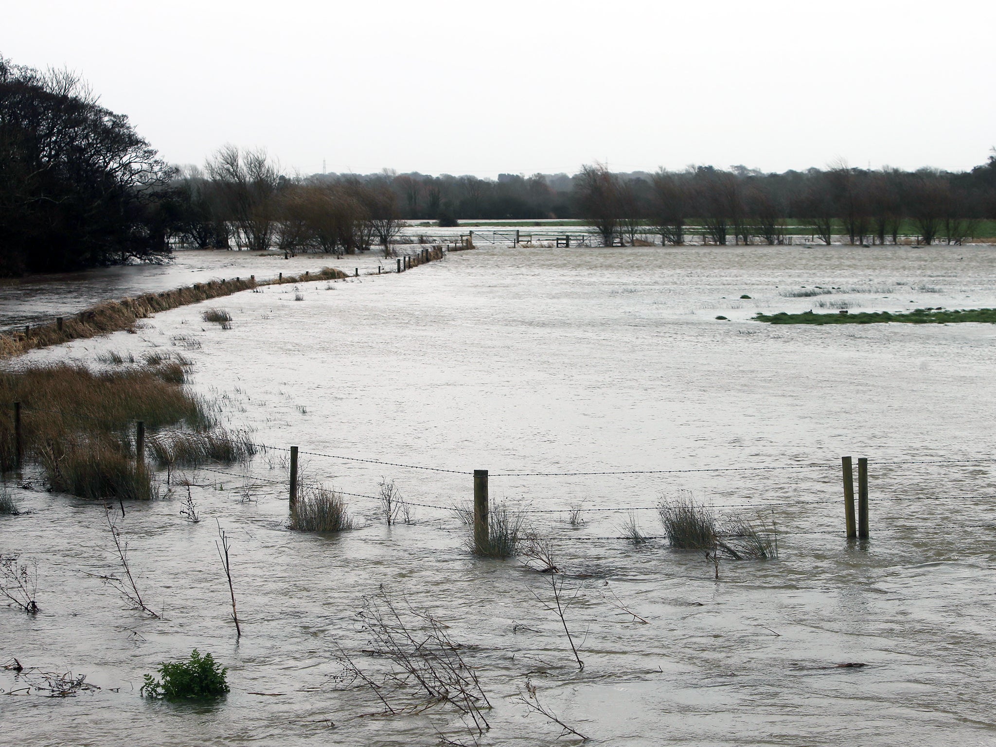 &#13;
A flooded road near Lower Brockhampton in Dorset&#13;