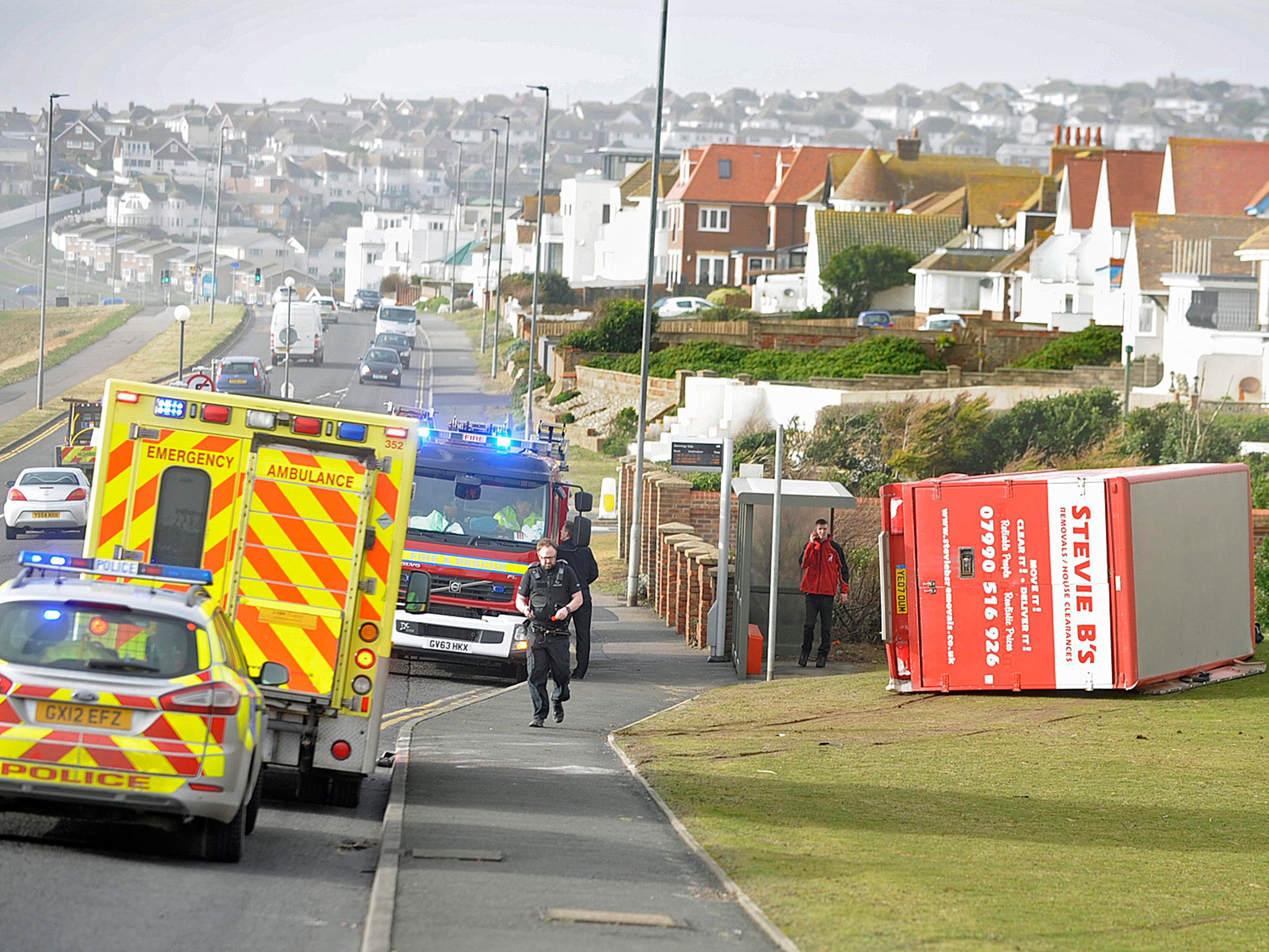 &#13;
A lorry lies overturned off the road when gale force winds hit Brighton&#13;