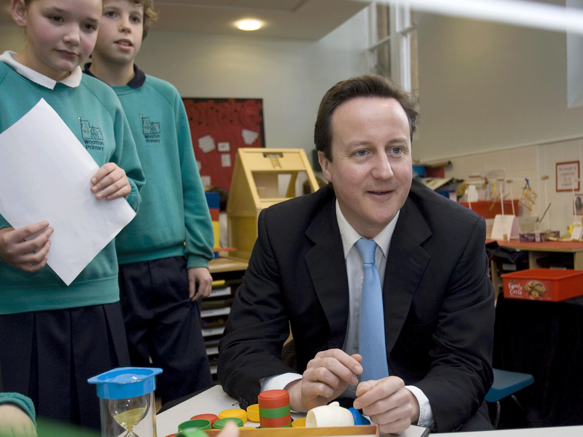 David Cameron has said he is "proud" of the UIFSM policy brought in by the Liberal Democrats