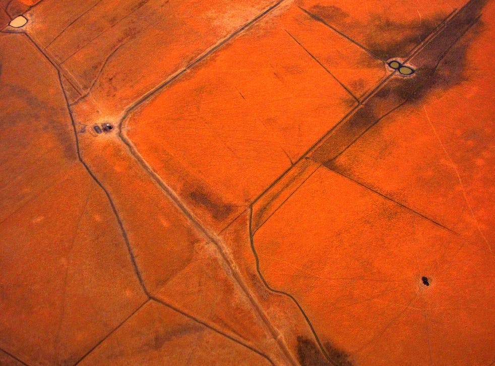An aerial view of small dams containing water are seen in dry paddocks located north-west of the city of Melbourne January 27, 2014