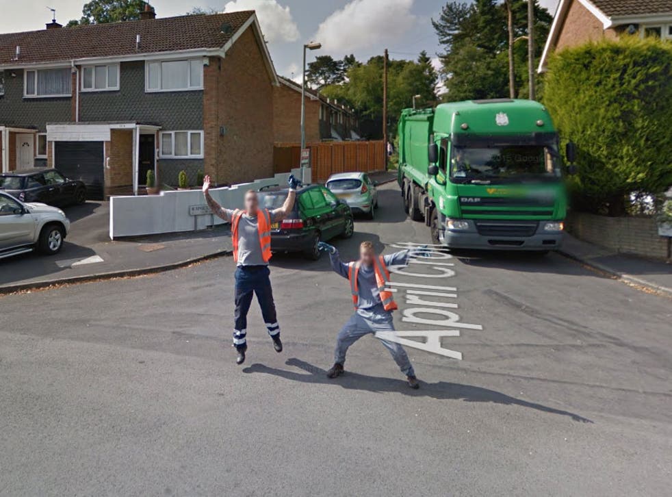 The unidentified binmen strike a pose for the Street View camera as it drives past