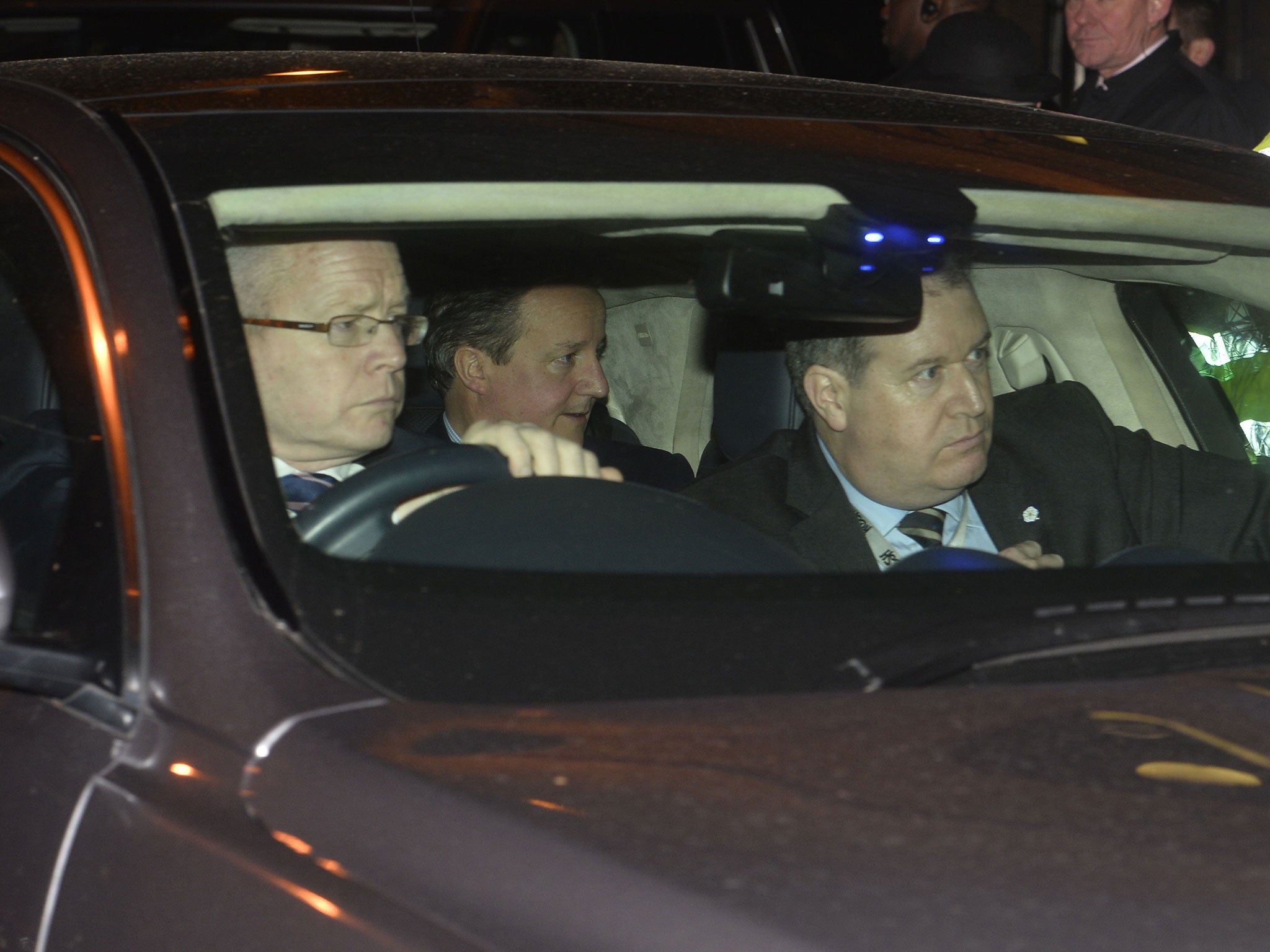 Prime Minister David Cameron leaves the ball