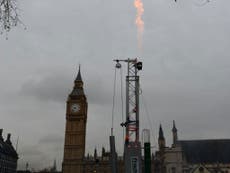 Greenpeace builds fracking rig outside Parliament in protest