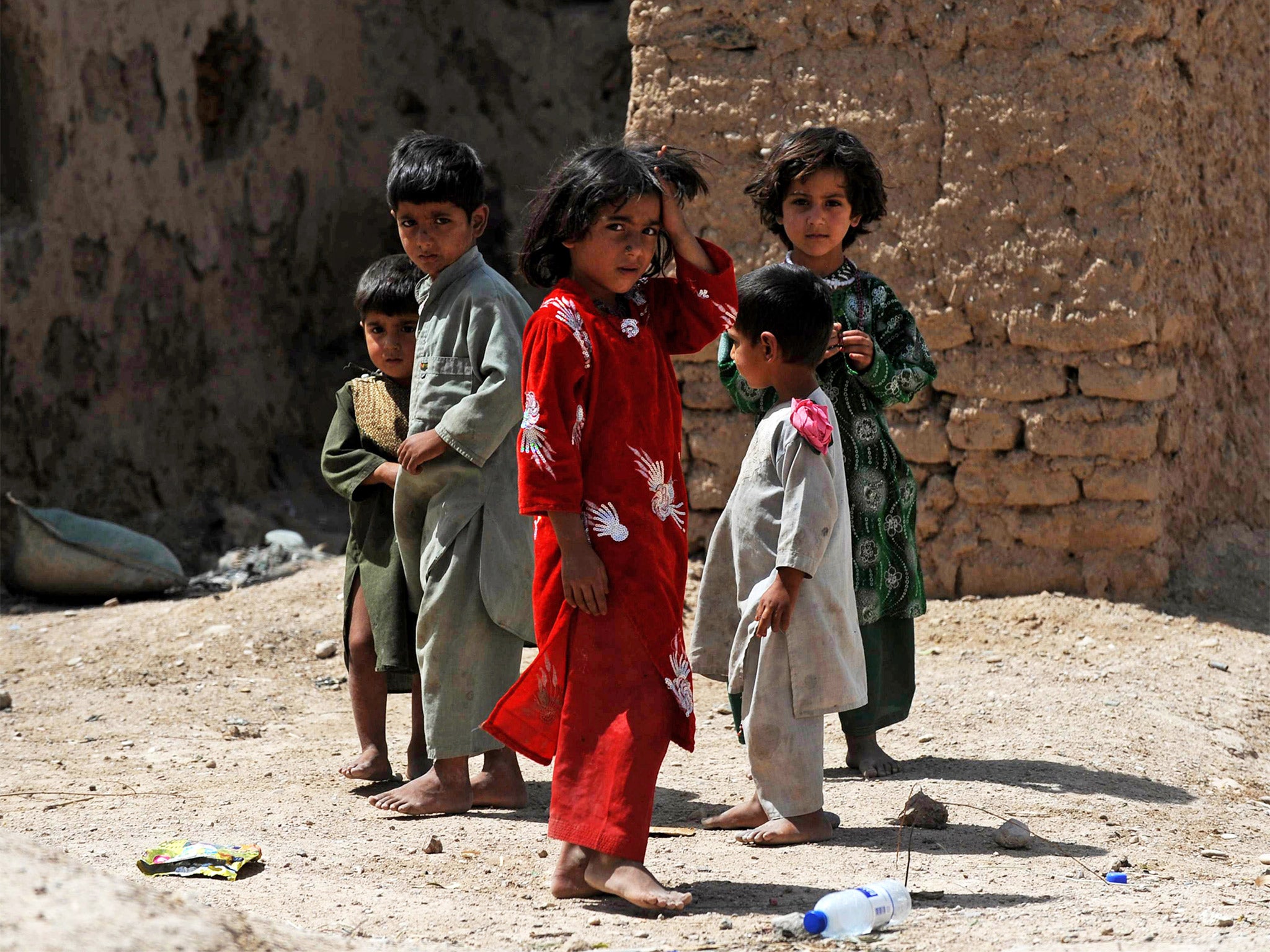 Children in Helmand province, Afghanistan. Some children deported from Britain claim they had
been left homeless, chased by the Taliban, kidnapped, ransomed and beaten