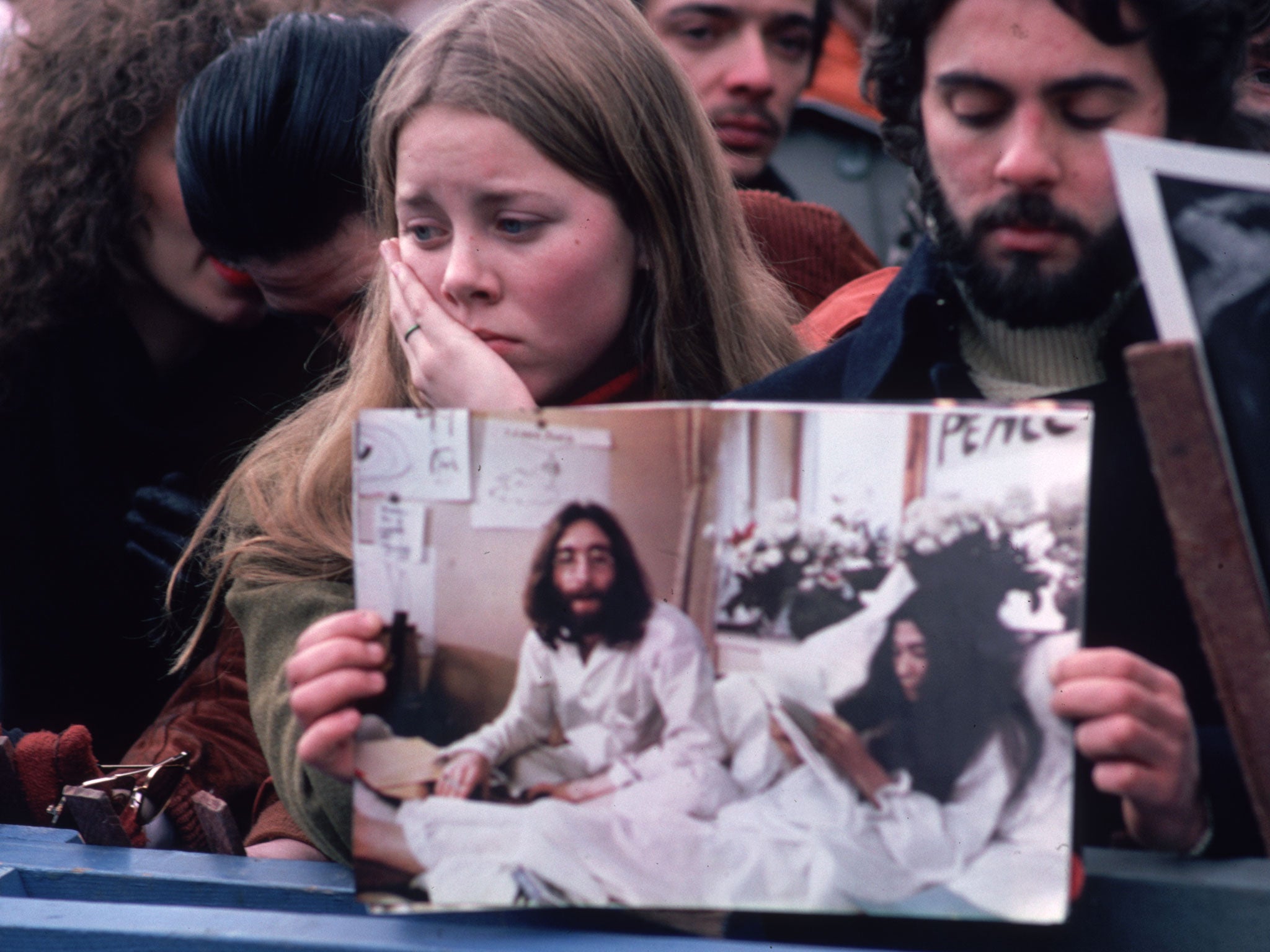 Fans mourn the death of John Lennon in 1980