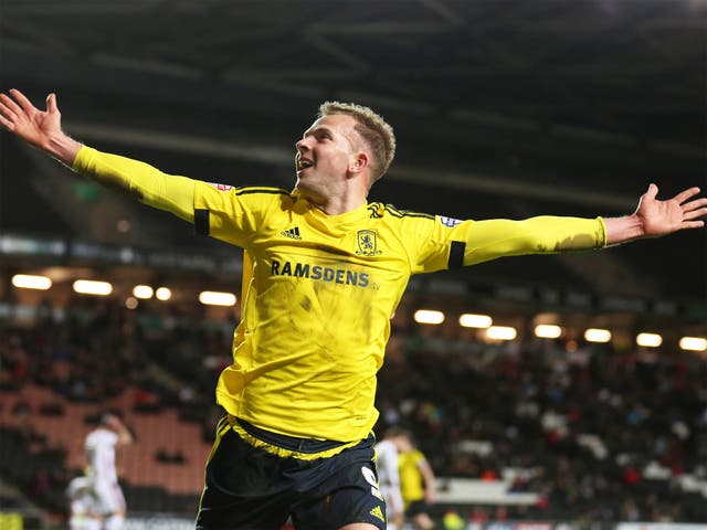 Jordan Rhodes celebrates after scoring the injury-time equaliser that earned his new club a point