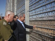 Netanyahu pledges fence around all of Israel 'to keep out wild beasts'