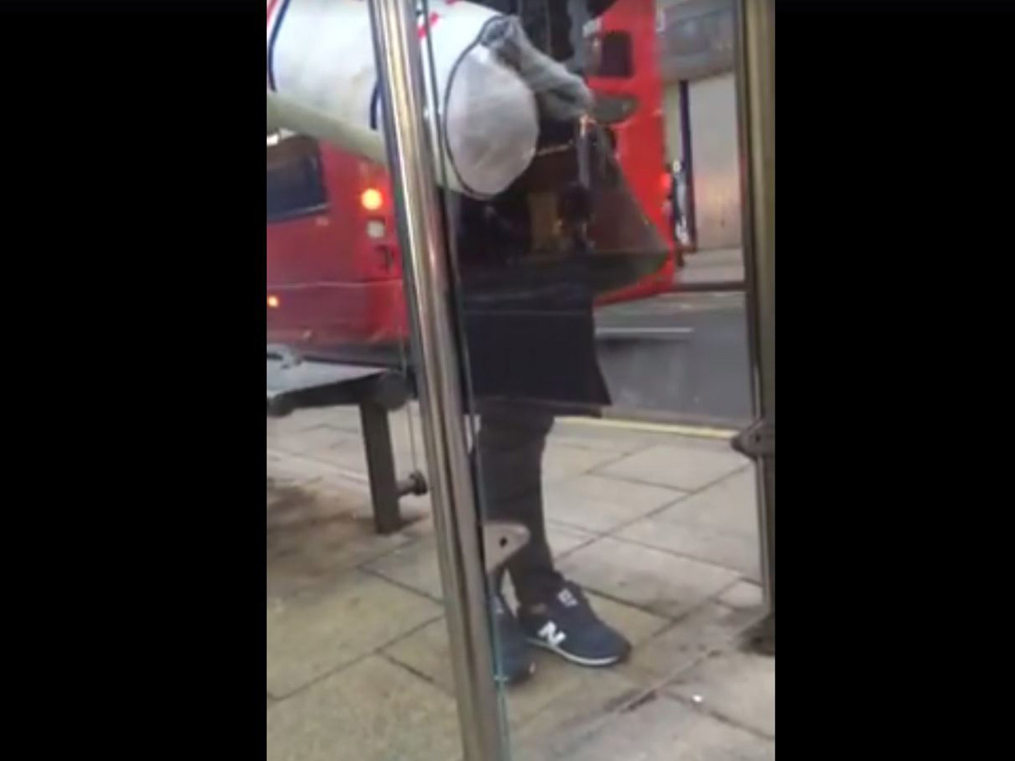 The bus driver driving off and leaving Melody stranded on the kerb