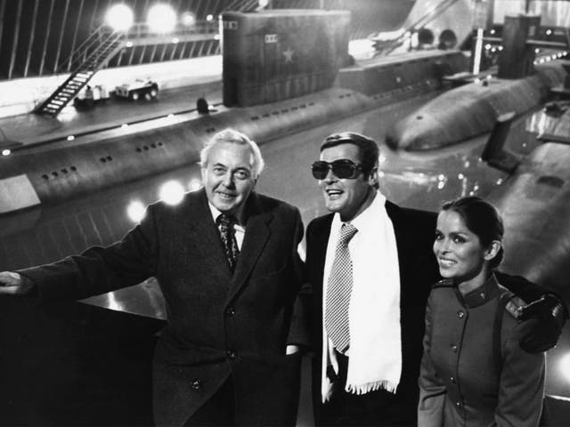 Prime Minister Harold Wilson (left) with Roger Moore and Barbara Bach on the James Bond set at Pinewood in 1976