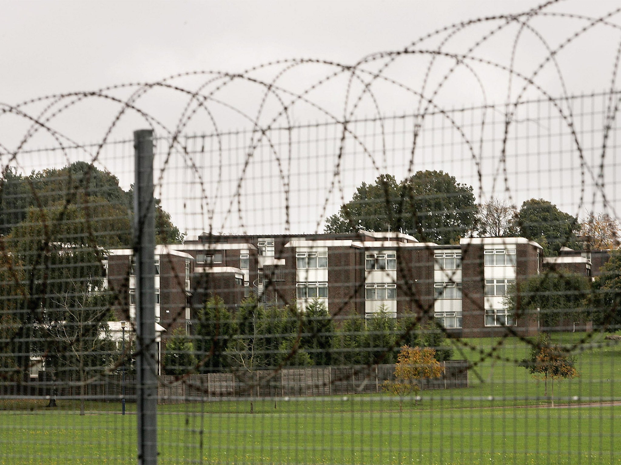 Barb wire surrounds the Defence College of Logistics at Deepcut, near Camberley