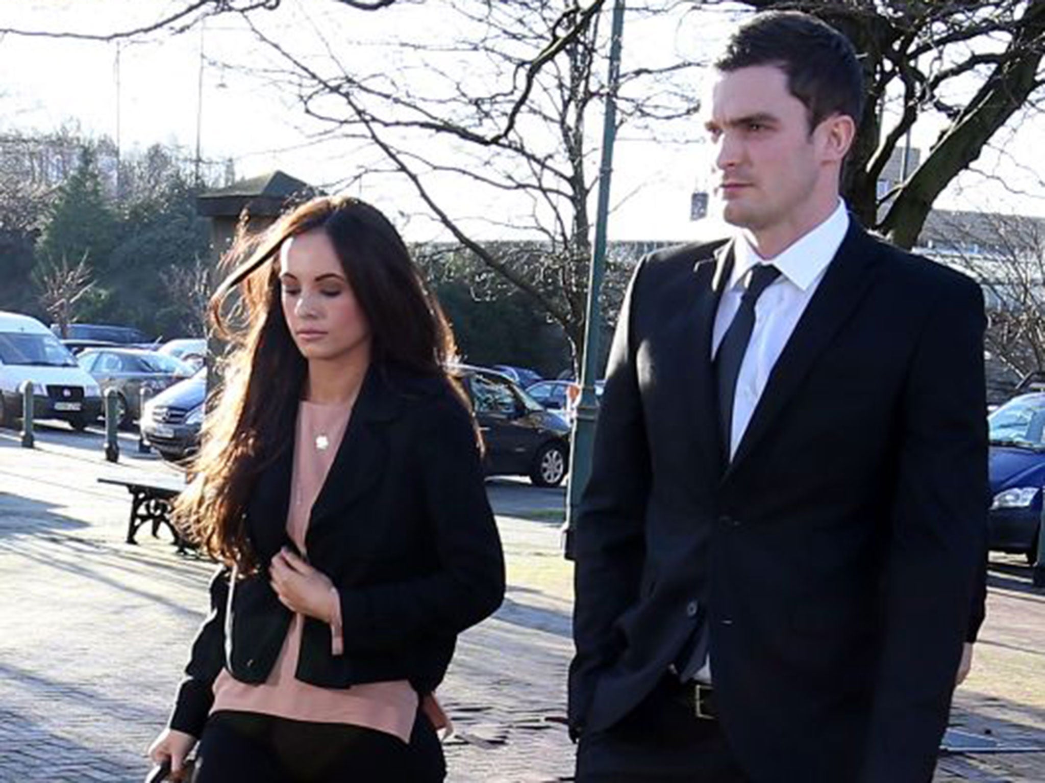 Adam Johnson at Bradford Crown Court with his girlfriend, Stacey Flounders