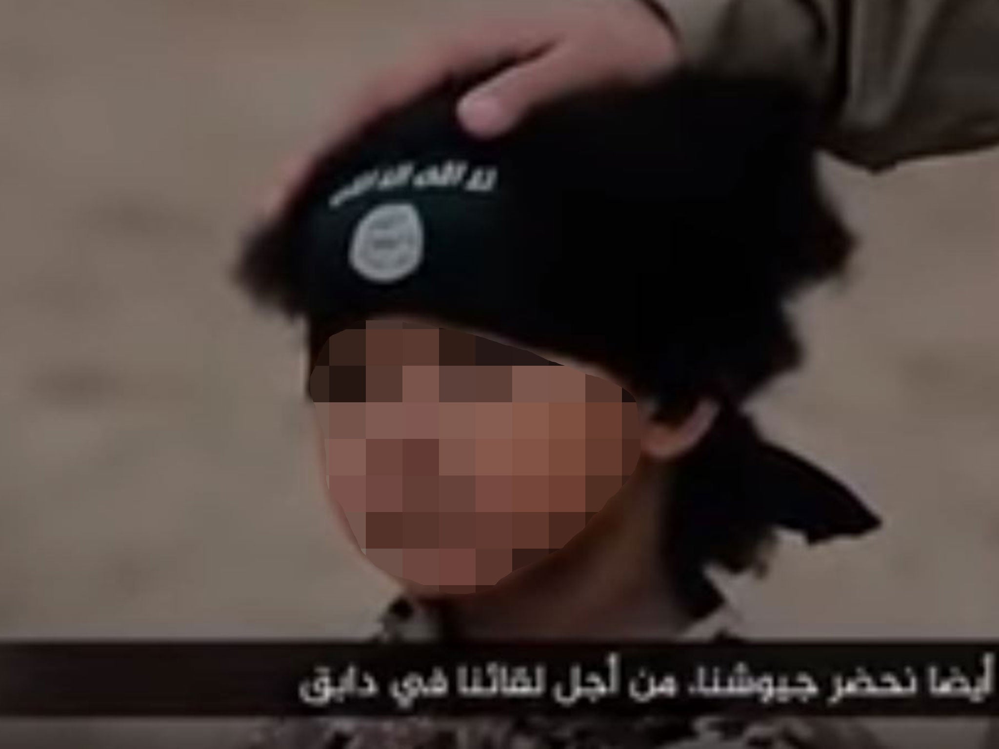 The boy is seen in the execution video