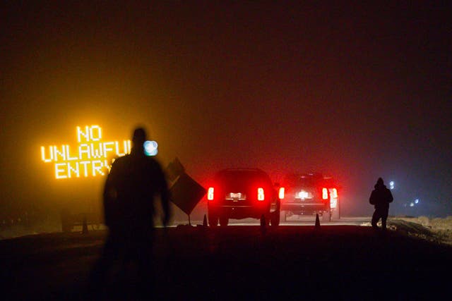 FBI agents block the road to Malheur National Wildlife Refuge