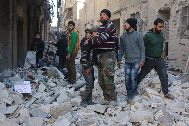 Syrian civilians among the rubble in rebel-held Aleppo after Russian-backed air strikes