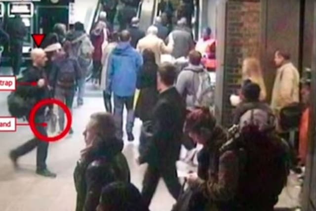Footage showed Mark Pearson walking through the station where he was accused of assaulting the woman