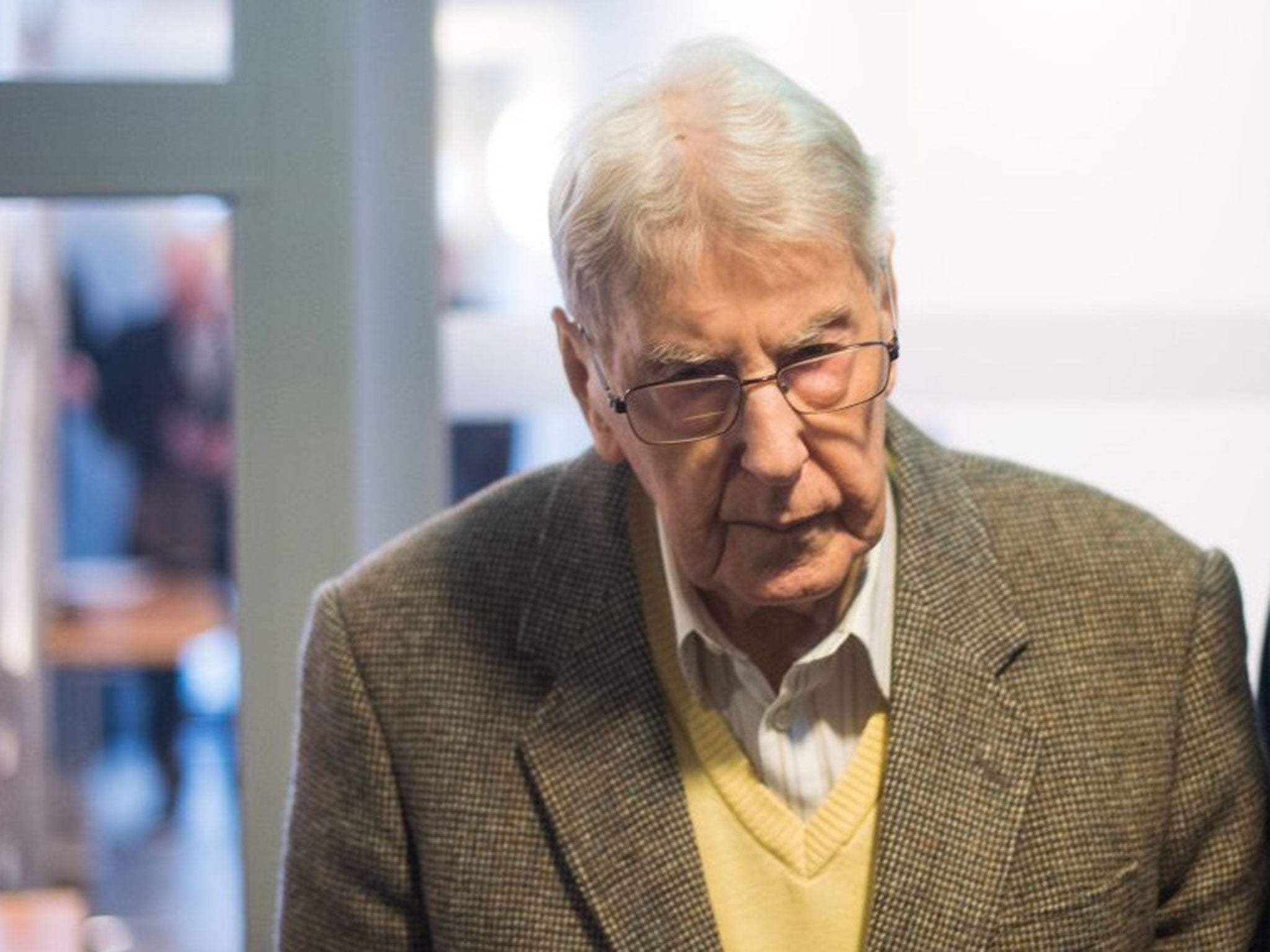 Reinhold Hanning denies being involved in the mass killings at the Auschwitz death camp in Nazi-controlled Poland