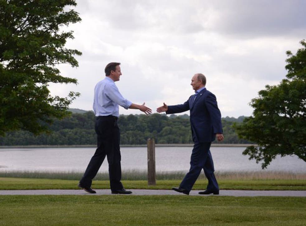 David Cameron welcomes Vladimir Putin to the G8 Summit in Northern Ireland in June 2013. The PM comes close to saying Russia’s president  would welcome a Brexit vote
