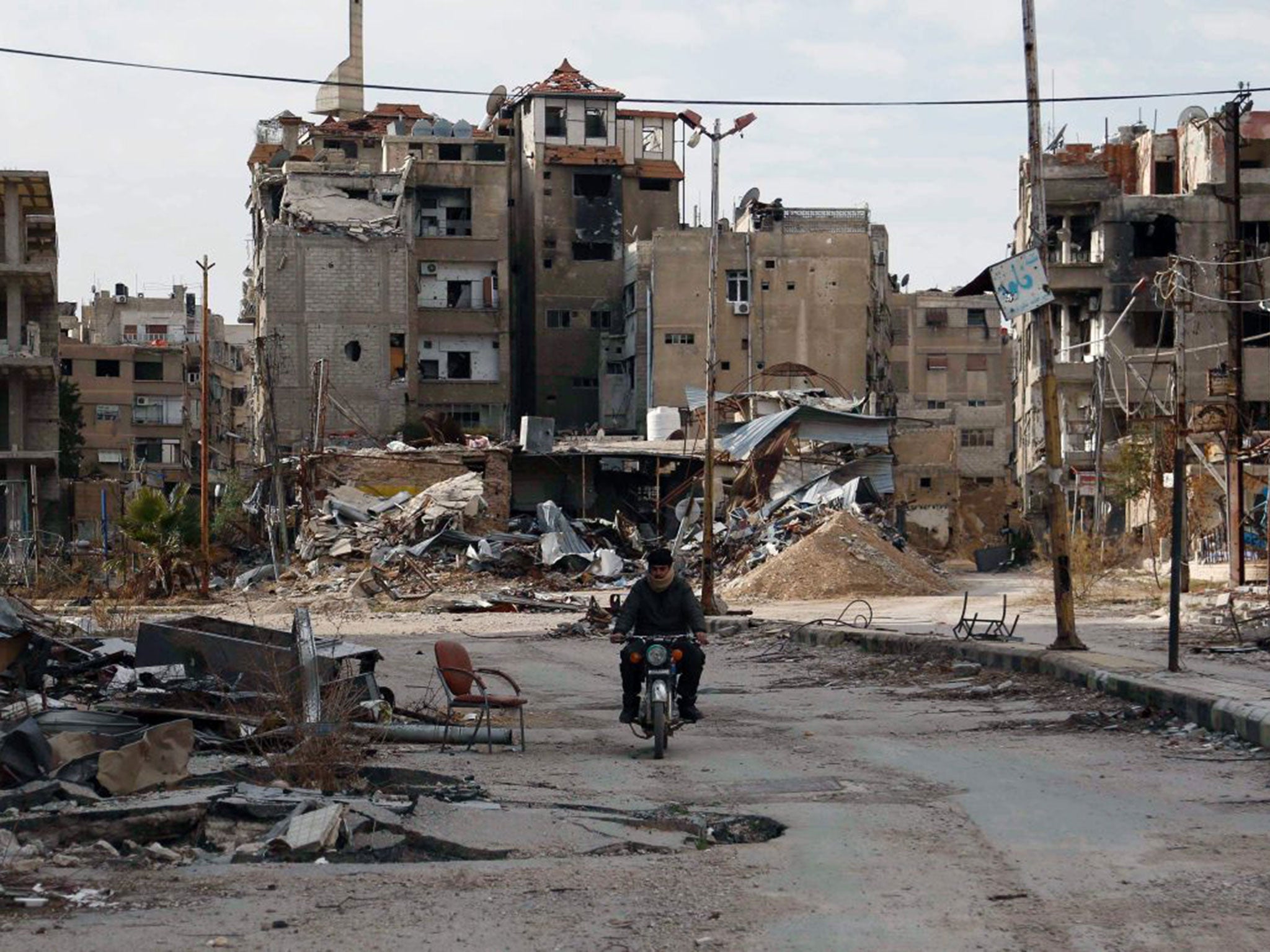 Harasta, east of Damascus, on Wednesday. Washington has accused Moscow of delaying a ceasefire in Syria