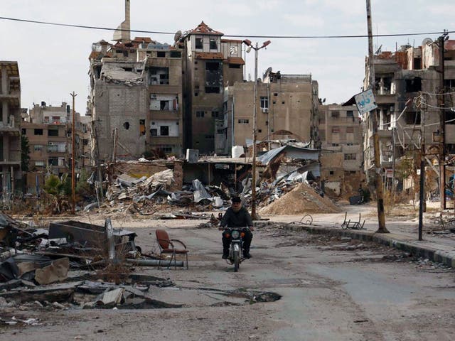 Harasta, east of Damascus, on Wednesday. Washington has accused Moscow of delaying a ceasefire in Syria