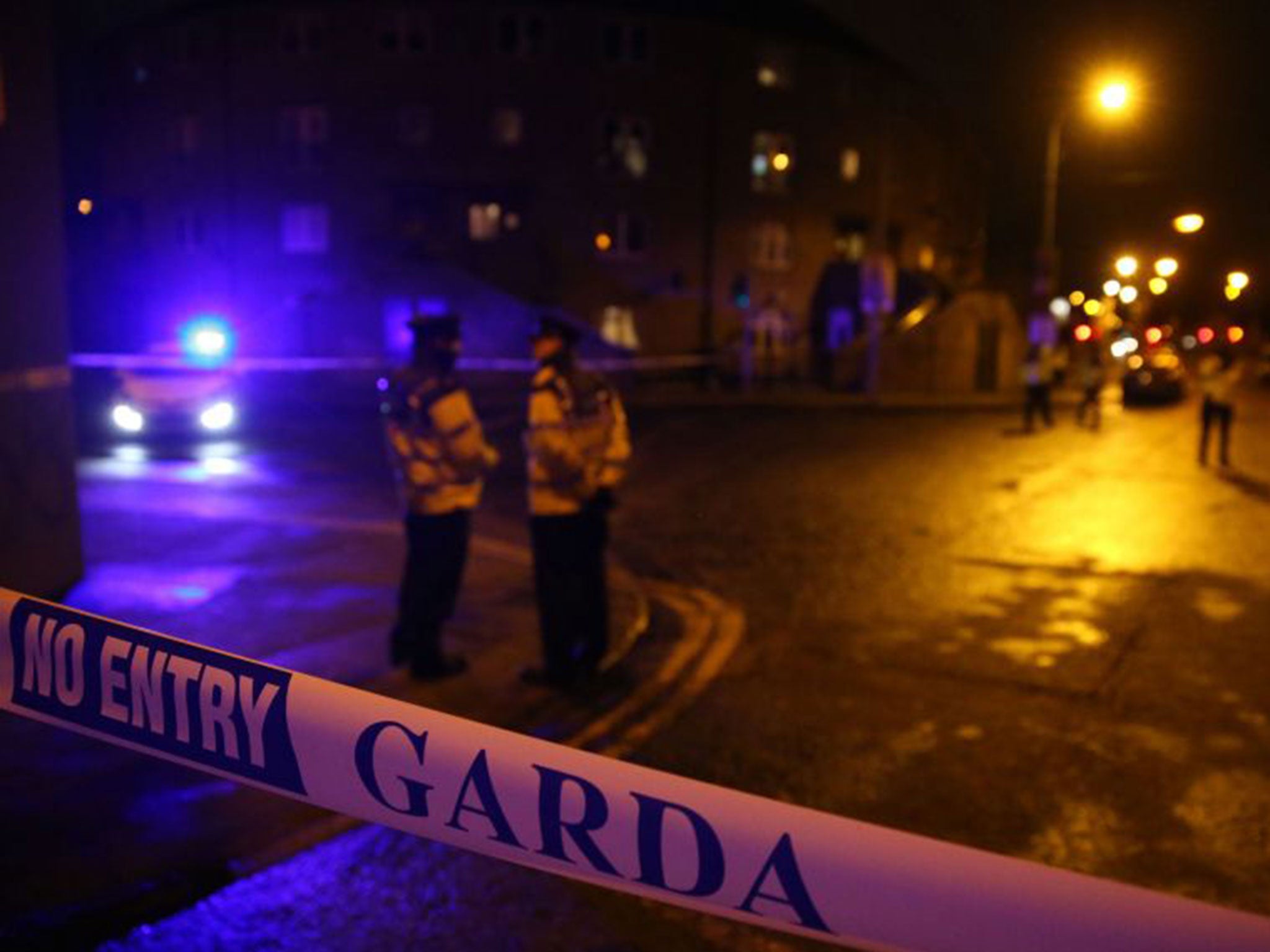 Garda officers attend the scene following the shooting of a second man in Dublin earlier this week