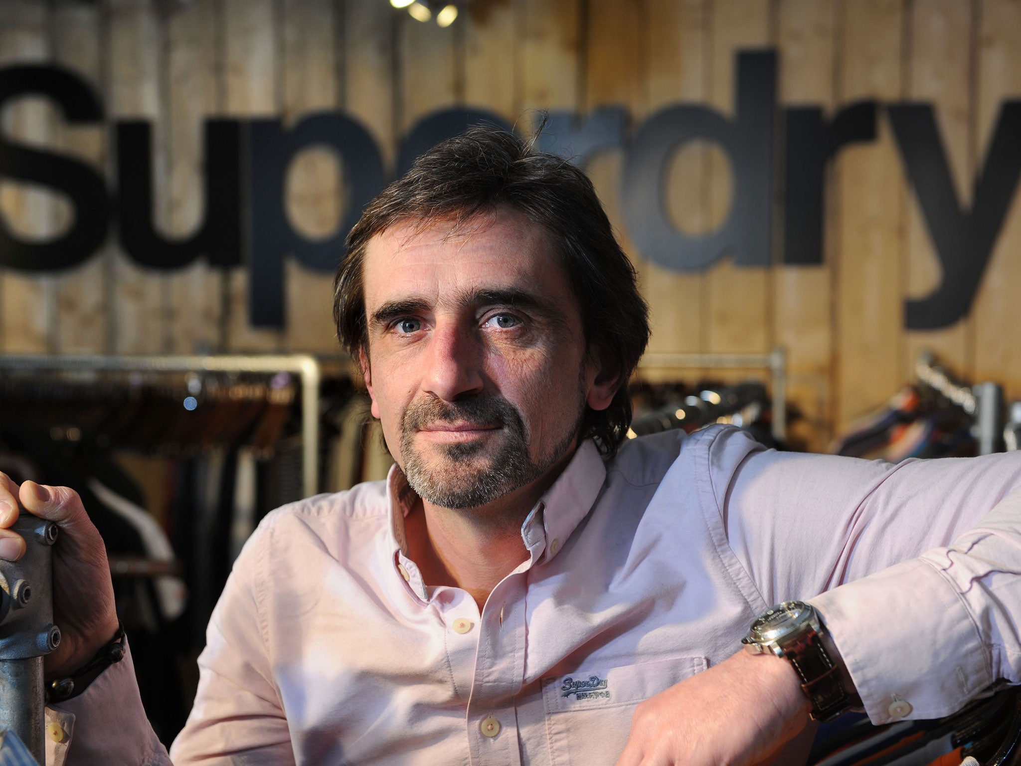 Julian Dunkerton launched the SuperDry label from a market stall in Cheltenham