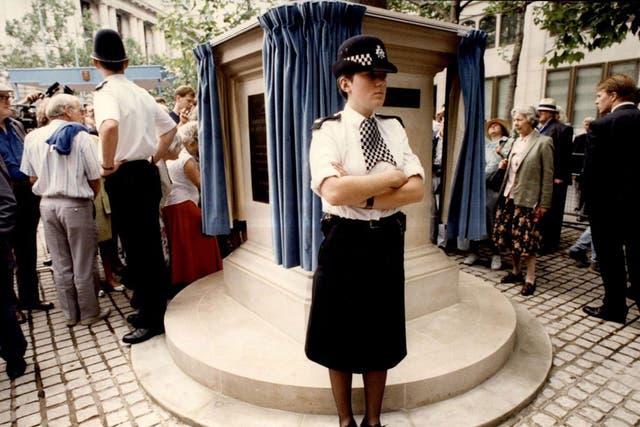 Don't move: police stand guard round 'Bomber' Harris in 1992