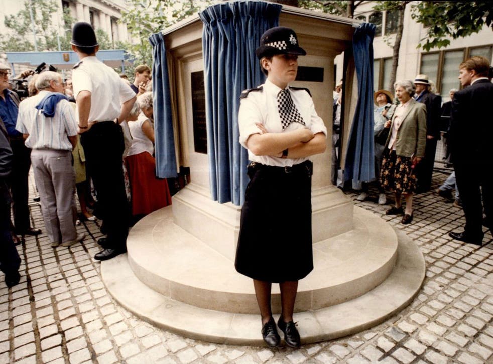 Don't move: police stand guard round 'Bomber' Harris in 1992