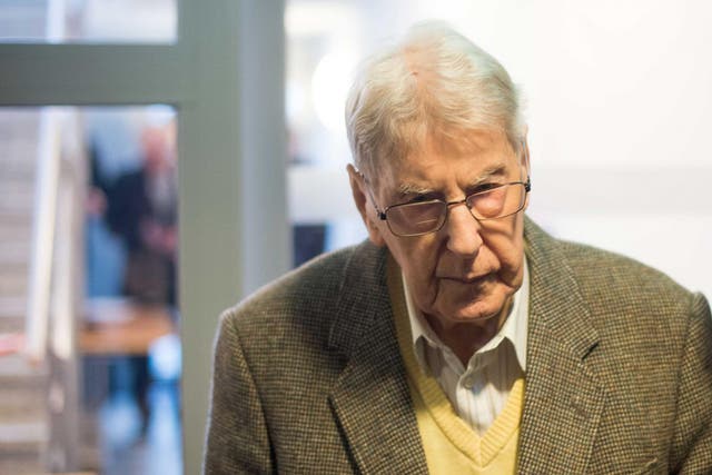 Reinhold Hanning admits having worked at Auschwitz but denies any involvement in mass murder