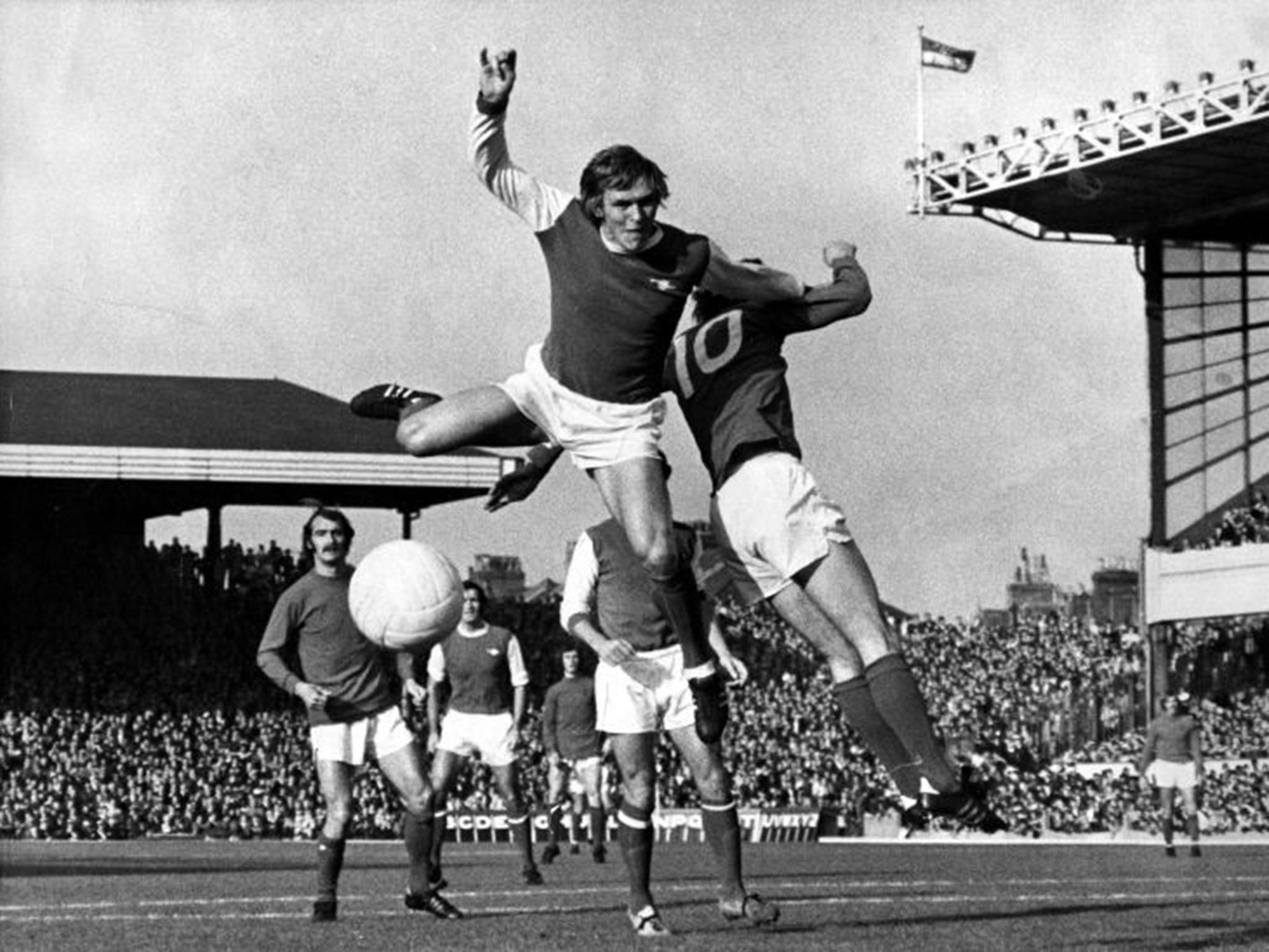 Powerful: Roberts rises highest at Highbury in October 1971